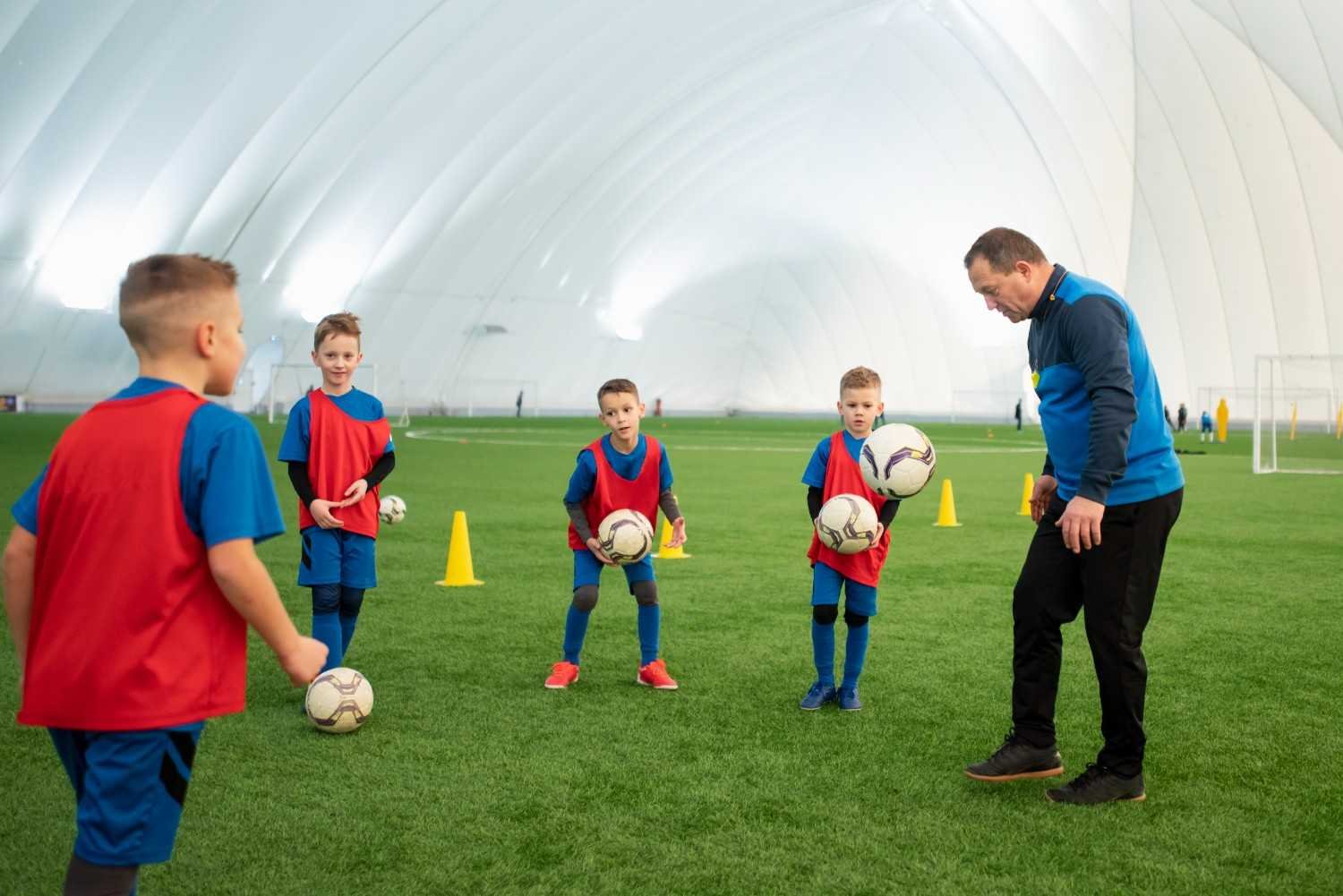 How Do Football Camps Improve Position-Specific Skills and Game Strategy?